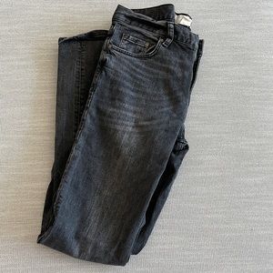 Washed black skinny jeans